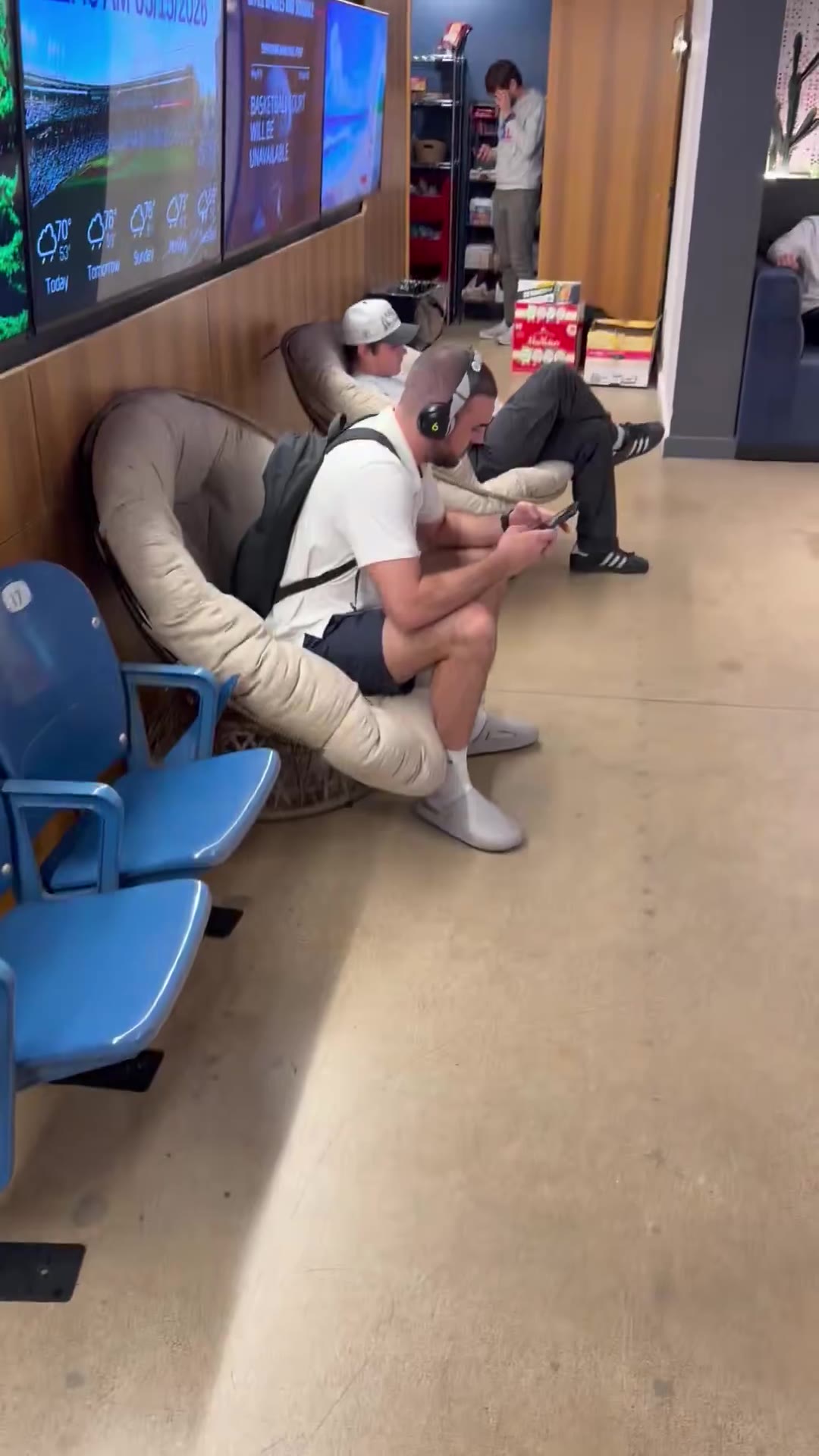 Big Cat: Nikki is sitting in the main entrance of the office, not talking to anyone, just letting everyone know he’s listening to