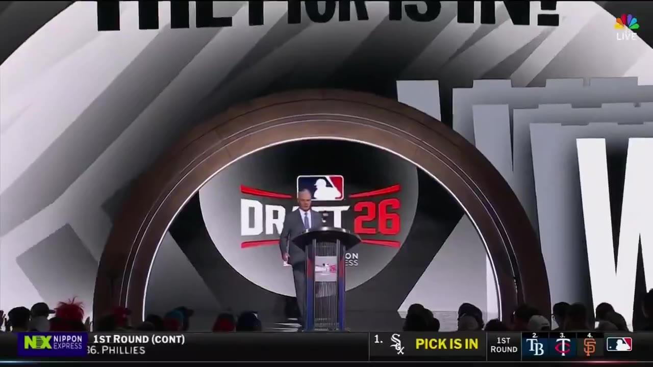 Rob Manfred speaking at a podium in front of an MLB Draft 2026 backdrop, with a lower-third graphic reading 'White Sox Selection' and 'Pick is in, 1st Round' alongside team logos for the White Sox, Rays, Twins, and Giants.
