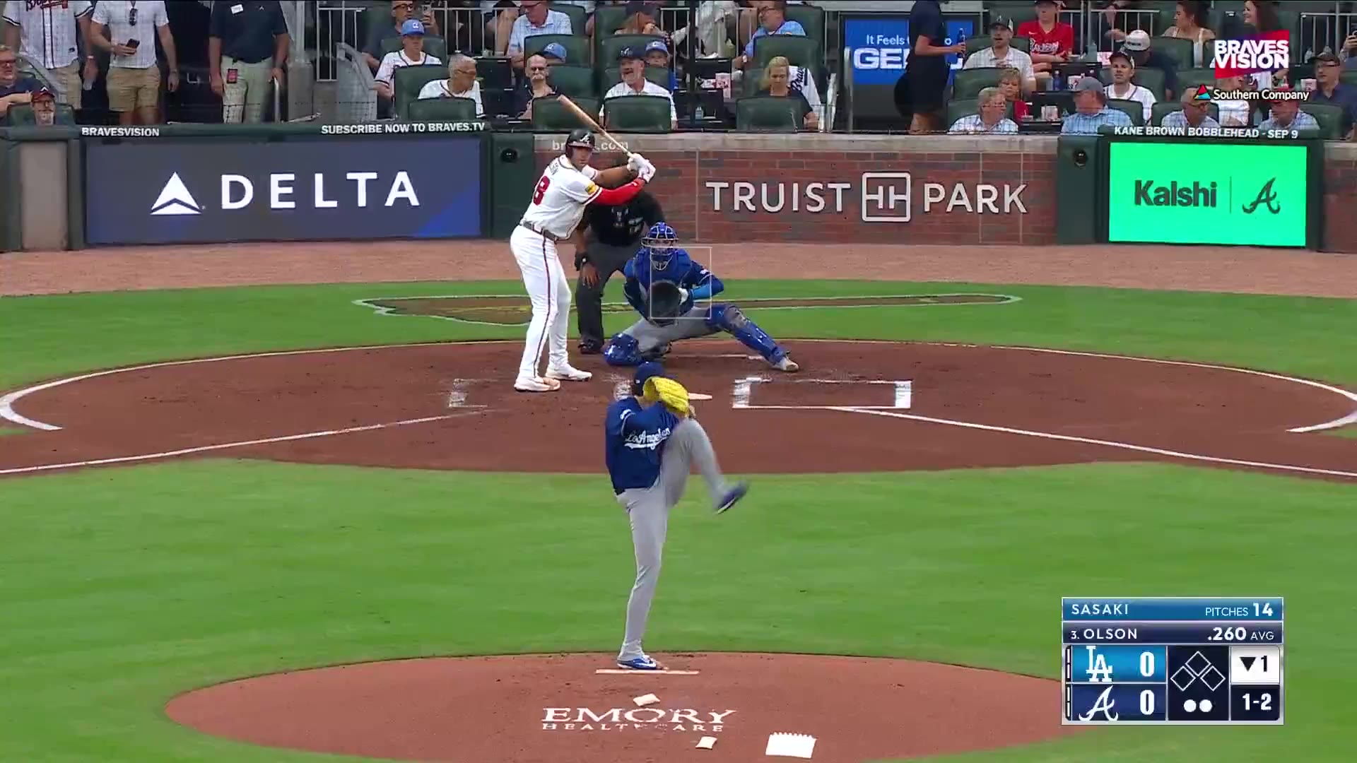 Matt Olson rounds first base after hitting a home run for the Atlanta Braves, with an aerial replay of the ball landing beyond the outfield stands at Truist Park; on-screen stats show 400 ft distance, 110.4 mph exit velocity, 25 degree launch angle.