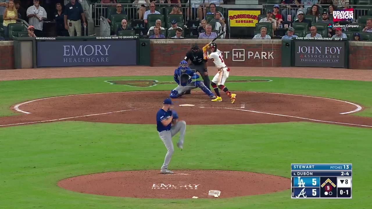 A Los Angeles Dodgers infielder slides into second base attempting a tag as an Atlanta Braves baserunner arrives, with a Texas Rangers infielder (blue road jersey) fielding and throwing the ball to first base; on-screen scoreboard shows LA 5, ATL 5, top of the 8th, Dubon batting 2-4, 84 MPH sweeper pitch.