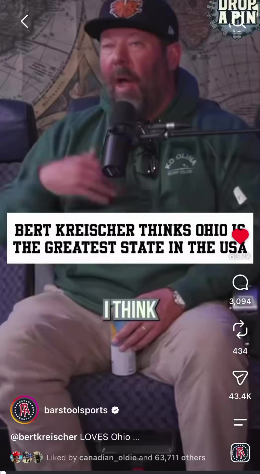 A podcast interview setting with two men speaking into microphones at a desk with a chain-link backdrop, followed by a different bearded man in a green hoodie and Knicks cap holding a drink can and talking into a microphone, with on-screen captions reading phrases like 'NOT LUNATICS' and 'OHIO IS GORGEOUS' overlaid on the video.