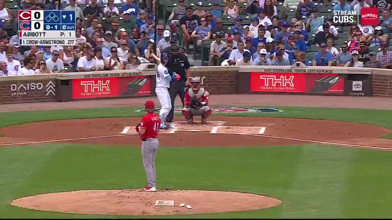A Cubs home run trot at Wrigley Field, with a fan-cam shot of the crowd celebrating in the outfield seats and an on-screen exit velocity of 105.8 MPH; scoreboard shows Cubs 1, opponent 0, top of the 1st, 0 outs.