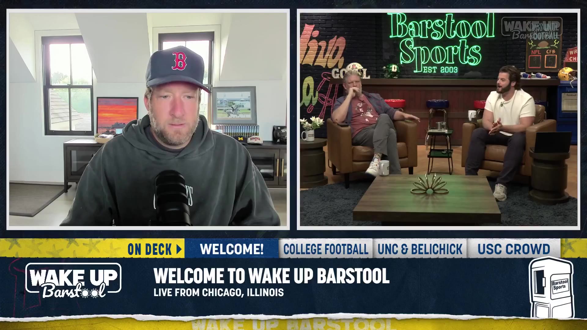 Two men on a split-screen video podcast set, one wearing a Boston Red Sox cap and grey hoodie speaking into a microphone, the other wearing a maroon jersey seated in a leather chair in a studio decorated with plants and a wall mural; lower-thirds read COLLEGE FOOTBALL, UNC & BELICHICK, USC CROWD, AARON DONALD, and 2026 COLLEGE FOOTBALL SEASON UNDERWAY, with a WAKE UP BARSTOOL logo.